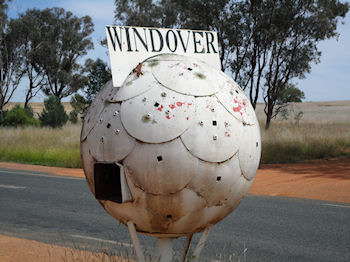 Elegant welding job using discs from a plough. The letter box is over three feet in diameter.