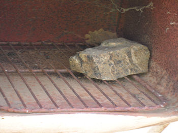 And to keep the mail dry there is usually something in the bottom. Cheap folk use a bit of stray weldmesh. The really  serious folk raid an old regrigerator.