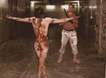 Jailer and prisoner Abu Ghraib