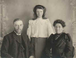 Tom Flood, Elizabeth and Hilda (standing)